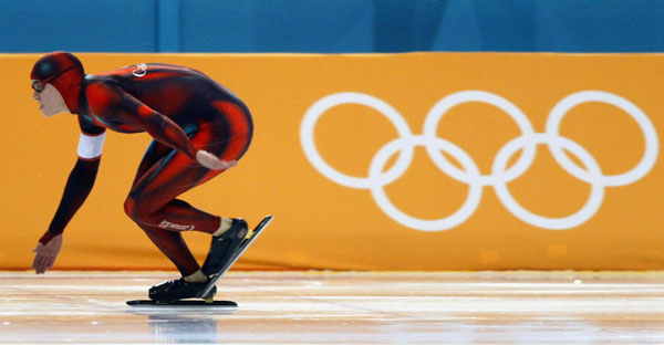 Canadian long-track speed skater Mike Ireland races during his 500-metre heat in Salt Lake City, Utah Tuesday Feb. 12, at the 2002 Winter Olympic Games. (CP Photo/COA/Andre Forget)