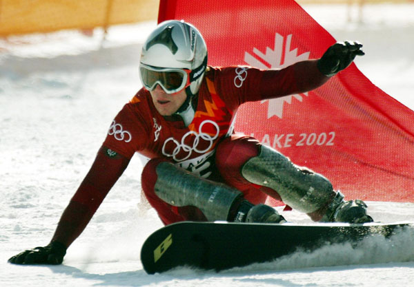 Jasey-Jay Anderson, of Mont-Tremblant, Que., races down the slalom course during the men's parallel giant slalom qualifications in Park City, Utah, Thursday Feb. 14, at the 2002 Winter Olympic Games.  Anderson failed to qualify. (CP PHOTO/COA-Andre Forget