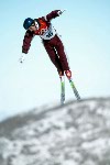 Andy Capicik of Toronto flies over Deer Valley, Utah, to qualify sixth for Tuesday's aerials final at the Winter Olympics, Sat., Feb. 16, 2002.  (CP PHOTO/COA/Mike Ridewood)