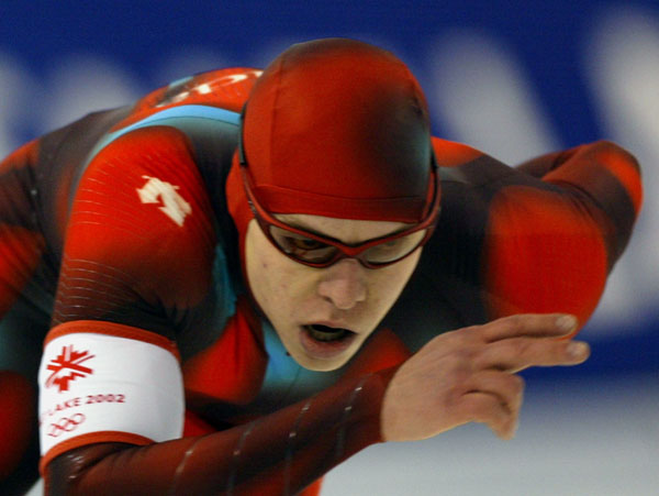 Canadian speed skater Mike Ireland skates during the Mens 1000 meter in Salt Lake City, Utah Saturday Feb. 16, at the 2002 Winter Olympic Games.   (CP Photo/COA/Andre Forget)