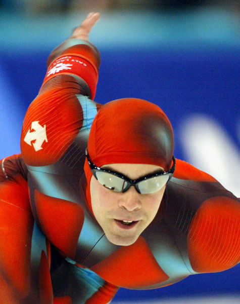 Canadian speed skater Patrick Bouchard skates during men's 1,000 metre speed skating in Salt Lake City, Utah Saturday Feb. 16, at the 2002 Winter Olympic Games. (CP Photo/COA/Andre Forget)