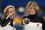 Canada's skip Kelley Law (left) and second Georgina Wheatcroft talk strategy during Canada's 9-5  win over the U.S.A. in the bronze medal game at the Winter Olympics in Ogden, Utah duringThursday, Feb. 21, 2002  (CP PHOTO/COA/Mike Ridewood)