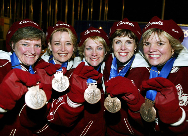 Canadian Womens Curling team (left to right)  Cheryl Noble, of Victoria, Kelley Law, of Coquitlam, B.C., Diane Nelson, of Burnaby, B.C., Julie Skinner, of Victoria, and Georgina Wheatcroft, of Victoria, show off their bronze medals Thursday Feb. 21, 2002,