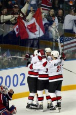 Joe Sakic (91) celebrates a score during the final against Team USA at the 2002 Olympic Winter Games in Salt Lake City. Team Canada won 5-2 over Team USA for the gold. (CP Photo/COA/Andre Forget).