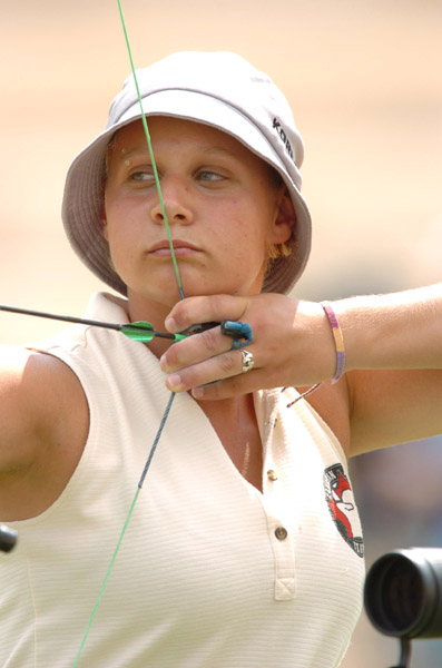 Marie-Pier Beaudet of Canada focuses on her target during the first round of the women's archery individual eliminations competition at the 2004 Olympic Games at the Panathinaiko Stadium in Athens, Sunday August 15, 2004. (CP PHOTO/COC-Andre Forget)