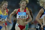 Canada's Courtney Babcock of Chatham, Ont. runs to a ninth place in a heat of women's 1500 metres and failed to qualifty for the semi-final in track and field action at the Athens Olympics, Tuesday, August 24, 2004.(CP PHOTO)2004(COC-Mike Ridewood)