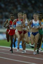 Canada's Courtney Babcock of Chatham, Ont. runs to a ninth place in a heat of women's 1500 metres and failed to qualifty for the semi-final in track and field action at the Athens Olympics, Tuesday, August 24, 2004.(CP PHOTO)2004(COC-Mike Ridewood)
