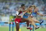 Canada's Perdita Felicien of Pickering, Ont. was second in her heat of women's 100 metre hurdles in track and field action at the Athens Olympics, Sunday, August 22, 2004.(CP PHOTO/COC-Mike Ridewood)