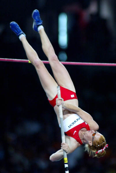 Canada's Stephanie McCann of Surrey, B.C. jumps to a tenth place in women's pole vault in track and field action at the Athens Olympics, Tuesday, August 24, 2004.(CP PHOTO)2004(COC-Mike Ridewood)