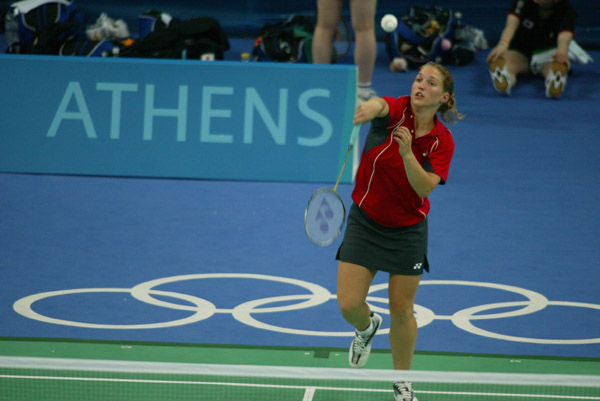 Helen Nichol of Burlington, Ontario, hits the birdie during a badminton training for the summer Olympic Games in Athens, Greece, Tuesday, August 10, 2004. (CP PHOTO/COC-Mike Ridewood)