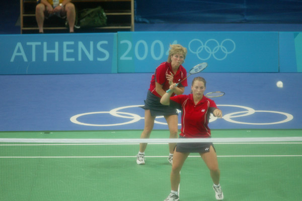 Helen Nichol of Burlington, Ontario (front) and Charmaine Reid of Calgary (back) during a badminton training for the summer Olympic Games in Athens, Greece, Tuesday, August 10, 2004. (CP PHOTO/COC-Mike Ridewood)
