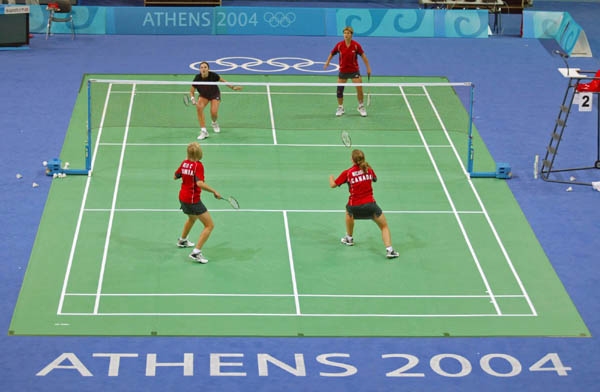 Women's doubles badminton athletes (clockwise) Anna Rice of Vancouver, Denyse Julien of Calgary, Helen Nichol of Burlington, Ont. and Charmaine Reid of Calgary train for the summer Olympics in Athens, Greece, Tuesday, August 10, 2004.  (CP PHOTO/COC-Mike Ridewood)