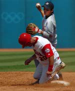 Robert Ducey stretchs out during practice of the Canadian Baseball team at the Athens 2004 Summer Olympic Games August 12, 2004. (CP PHOTO 2004/Andre Forget/COC)