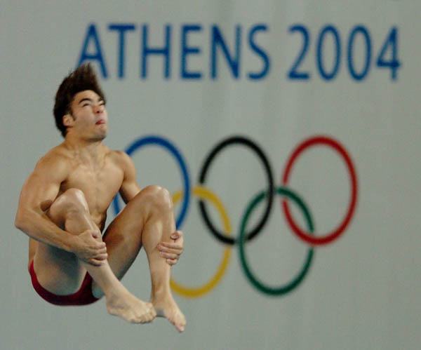 Alexandre Despatie of Canada dives during training prior to the Athens 2004 Summer Olympic Games August 12, 2004. (CP PHOTO 2004/Andre Forget/COC)