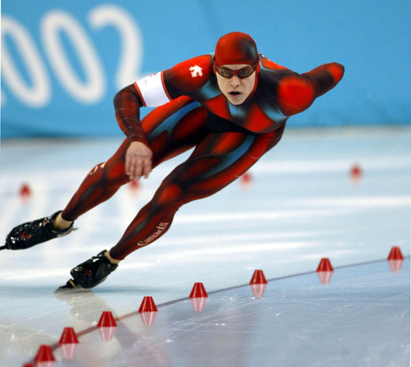 Canadian long-track speed skater Mike Ireland races during his 500-metre heat in Salt Lake City, Utah Tuesday Feb. 12, at the 2002 Olympic Winter Games. (CP Photo/COA/Andre Forget).
