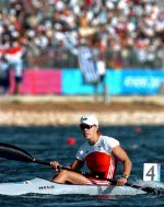 Canada's Caroline Brunet reacts after paddling to a bronze medal during the K1 500m final of the Athens 2004 Summer Olympic Games Saturday, August 28, 2004. (CP PHOTO/COC-Andre Forget)