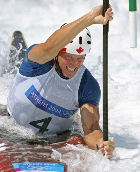 Canada's David Ford of Edmonton rounds a gate in kayak final action at the Athens Olympics, Friday, August 20, 2004.  Ford was fourth. (CP PHOTO/COC-Mike Ridewood)