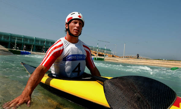 Canadian Slalom Kayaker David Ford pauses on the Kayak course during practice at the Athens 2004 Summer Olympic Games August 12, 2004. (CP PHOTO 2004/Andre Forget/COC)