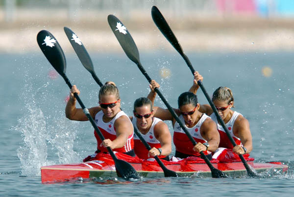Canada's Karen Furneaux, Carrie Lightbound, Kamini Jain and Jillian D'Alession paddle during the K4 500m final during the Athens 2004 Summer Olympic Games on Friday, August 27, 2004. The womens K4 team came in eighth. (CP PHOTO/COC-Andre Forget)