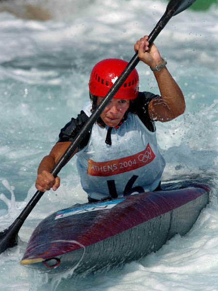 Canadian Margaret Langford of Lions Gate, B.C. powers through the Canoe/Kayak Slalom course during her K1 event of the Athens 2004 Summer Olympic Games  Tuesday August 17, 2004. (CP PHOTO/COC-Andre Forget)