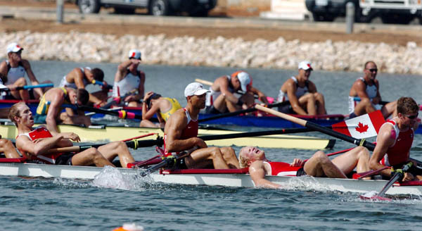 Canadian mens eight rowers from left to right Kreek Adam, Andrew Hoskins, Joe Stankevicius and Jeff Powel react after placing 5th during the Mens Eight final at the Athens 2004 Summer Olympic Games Sunday, August 22, 2004. (CP PHOTO 2004/COC-Andre Forget)