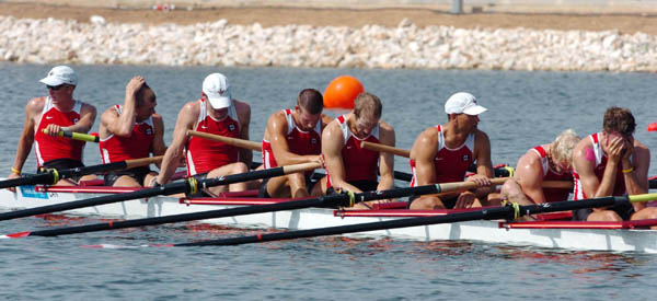 Canadian mens eight hold their heads after placing fifth during the final at the Athens 2004 Summer Olympic Games Sunday, August 22, 2004. (CP PHOTO/COC-Andre Forget)