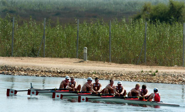 Canada's Mens Eight row away from the bassin after placing 5th in the final during the Athens 2004 Summer Olympic Games Sunday, August 22, 2004. (CP PHOTO/COC-Andre Forget)