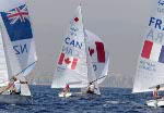 Canada's Jennifer Provan (left) of Toronto at skipper and Nikola Girke of Grande Prairie, Alta at crew are seen in the middle of the pack in the women's double-handed dinghy 470 at the Olympic Sailing Centre at the Athens Olympics, Saturday, August 21, 2004.  The pair finished the event in thirteenth place. (CP PHOTO/COC-Mike Ridewood)