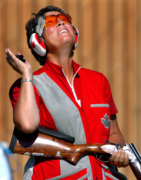 Susan Nattrass of Edmonton, Alberta looks to the sky after missing her shots during the qualification round of the Double Trap event of the Athens 2004 Summer Olympic Games Wednesday August 18, 2004. Nattrass did not advance.  (CP PHOTO/COC-Andre Forget)
