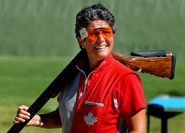 Susan Nattrass of Edmonton, Alberta smiles prior to the qualification round of the Double Trap event of the Athens 2004 Summer Olympic Games Wednesday  August 18, 2004. Nattrass did not advance.  (CP PHOTO/COC-Andre Forget)