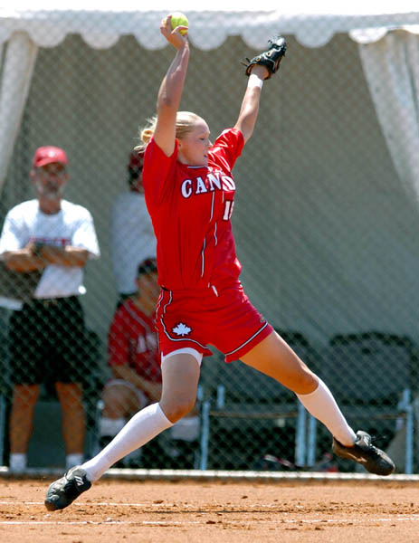 Canadian Womens's Olympic Softball Team member Ani Nyhus throws during practice prior to the Athens 2004 Summer Olympic Games August 11, 2004. (CP PHOTO 2004/Andre Forget/COC)