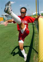 Canada's Kristy Odamura stretches before a practice game against Australia on August 11, 2004 at the Olympic Games in Athens. (CP PHOTO 2004/Andre Forget/COC)