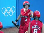 Erin White of Richmond, B.C. and Rachel Schill of Kitchener, Ont. celebrate the Canadian women's softball team victory over Taiwan 2 - 0 at the Athens Olympics, Saturday, August 14, 2004.  (CP PHOTO/COC-Mike Ridewood)