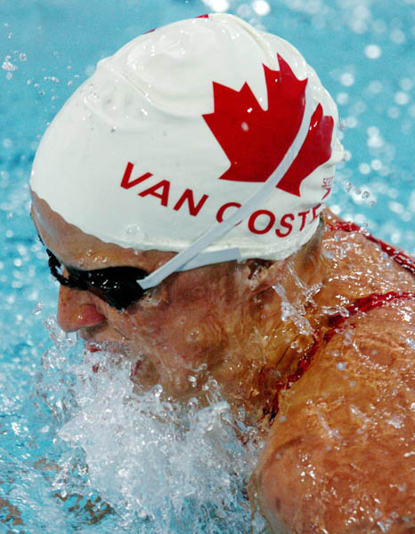 Lauren Van Oosten of Canada swims during the Womens 100M Breaststroke during the Athens 2004 Summer Olympic Games Sunday, August 15, 2004. (CP PHOTO/COC-Andre Forget)