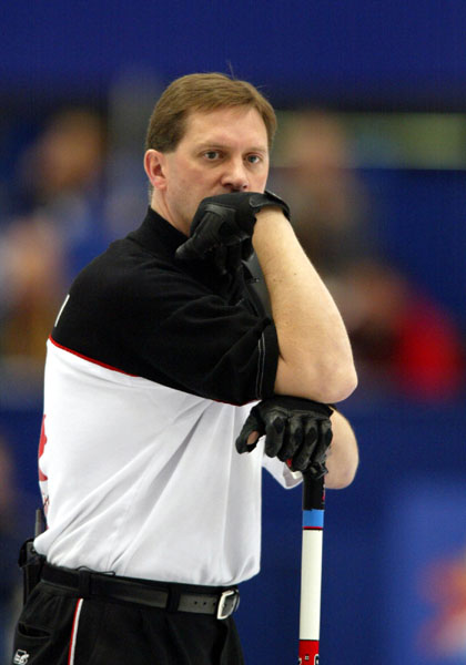 Canadian men's curling third Don Walchuk is focused on the game, during the 2002 Olympic Winter Games at Ogden, Utah, Friday Feb. 22, 2002 . (CP PHOTO/COA/Mike Ridewood).
