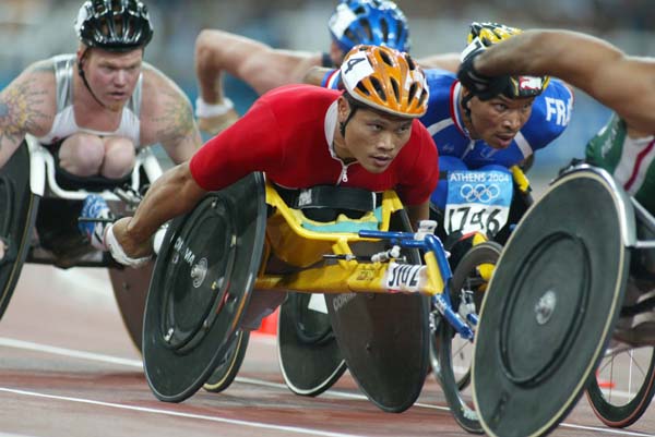 Canada's Jeffrey Adams of Brampton, Ontario (top left) in the men's wheelchair 800 metres in track and field action at the Olympic Games in Athens, Sunday, August 22, 2004.(CP PHOTO)2004(COC-Mike Ridewood)