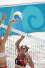 Canada's Annie Martin keeps her eyes on the ball after her hit at the Olympic Games in Athens, on August 14, 2004. (CP PHOTO)2004(COC-Mike Ridewood)