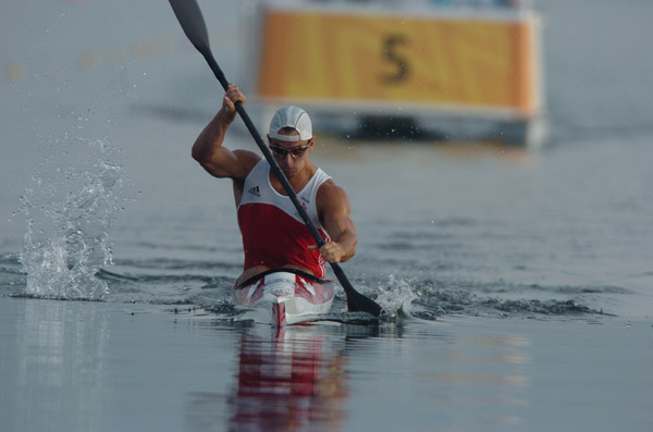Canada's Adam van Koeverden of Burlington, Ontario paddles during the K1 1000m final during the Athens 2004 Summer Olympic Games in Schinias, Greece, on Friday, August 27, 2004. Van Koeverden came in third for a bronze medal. (CP PHOTO/COC-Andre Forget)