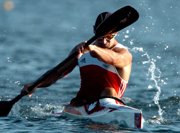 Canada's Adam van Koeverden paddles his way to gold during the K1 500m final at the Athens 2004 Summer Olympic Games Saturday, August 28, 2004. (CP PHOTO/COC-Andre Forget)