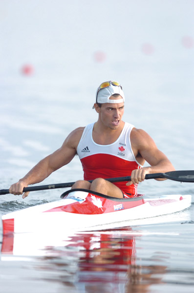Canada's Adam van Koeverden of Burlington, Ontario after crossing the line at the K1 1000m final during the Athens 2004 Summer Olympic Games in Schinias, Greece, on Friday, August 27, 2004. van Koeverden came in third for a bronze medal. (CP PHOTO 2004/Andre Forget/COC)