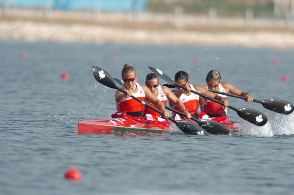 Canada's Karen Furneaux, Carrie Lightbound, Kamini Jain and Jillian D'Alessio paddle in the K4 500m final at the 2004 Summer Olympic Games in Athens on Friday, August 27, 2004. The women's K4 team came in eighth. (CP PHOTO/COC-Andre Forget)