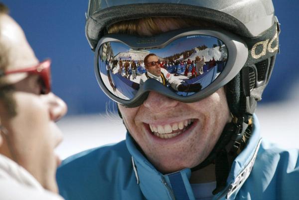 Canada's Kelly Ringstad, of Vancouver, talks with coach Bobby Aldighieri as he is relfected in her goggles at the finish area during Olympic moguls training at Deer Valley, Utah, Tuesday Feb. 5, 2002. (CP PHOTO/HO-COA-Mike Ridewood)