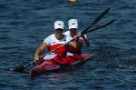 Canada's Caroline Brunet (left) and Mylanie Barre race during the K2 500m heat during the Athens 2004 Summer Olympic Games Tuesday August 24, 2004. The pair placed third in the heat.  (CP PHOTO/COC-Andre Forget)