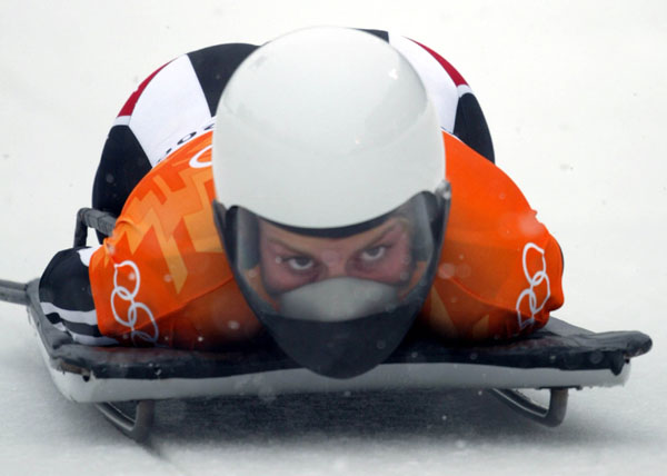 Canadian women's skeleton rider Michelle Kelly of Calgary slides head first down the track during competition Wednesday Feb. 20, at the 2002 Olympic Winter Games in Salt Lake City. (CP Photo/COA/Andre Forget).