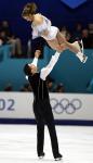 Jacinthe Lariviere, from Princeville, Que., and her partner Lenny Faustino, of Toronto, during the pairs free skate at the 2002 Olympic Winter Games in Salt Lake City. (CP PHOTO/COA/Andr Forget).