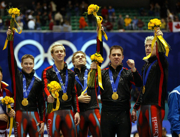 Canadian Short Track Gold medallists (left to right) Mathieu Turcotte, Jonathan Guilmette, Francois-Louis Tremblay Eric Bedard and Marc Gagnon after winning gold in the Men's 5000 metre Relay Saturday Feb. 23, 2002 at the 2002 Olympic Winter Games in Salt Lake City. (CP Photo/COA/Andre Forget).