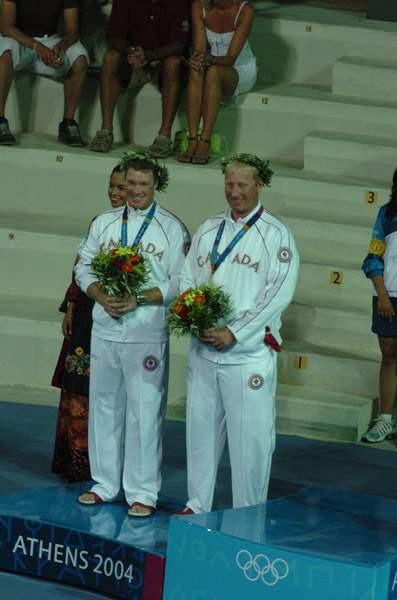 Canada's Ross MacDonald (left) of Vancouver, BC, and Mike Wolfs (right) of Port Credit, Ontario, won the silver medal in the star sailing event at the 2004 Summer Olympic Games in Athens on Saturday August 28, 2004. (CP PHOTO 2004/Andre Forget/COC)