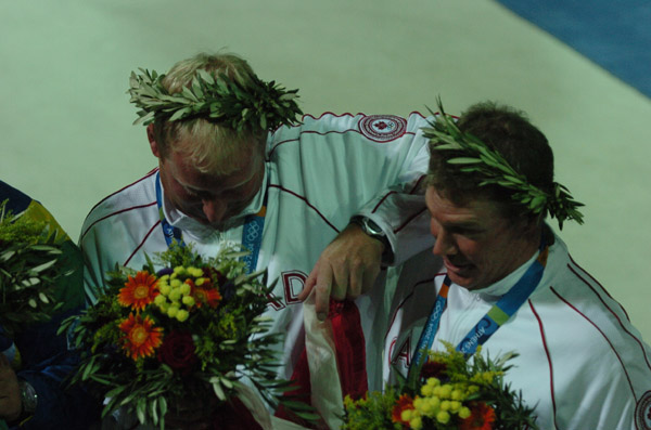Canada's Ross MacDonald (right) of Vancouver, BC, and Mike Wolfs (gauche) of Port Credit, Ontario, won the silver medal in the star sailing event at the 2004 Summer Olympic Games in Athens on Saturday August 28, 2004. (CP PHOTO 2004/Andre Forget/COC)