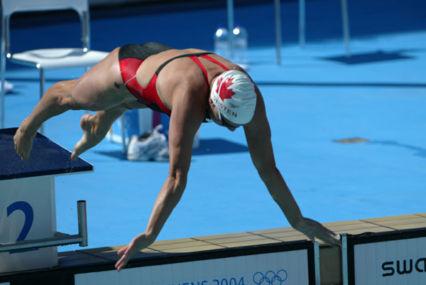 Canada's Lauren van Oosten of Calgary in 200-metre breaststroke action during qualifying heats at the 2004 Summer Olympic Games in Athens, Greece, Wednesday, August 18, 2004.  (CP PHOTO/COC/Mike Ridewood)