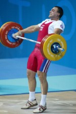 Canada's Akos Sandor of Mississauga, Ont. failed to make his lift in the men's 105 kg weightlifting competition at the Olympic Games in Athens, Tuesday, August 24, 2004. (CP PHOTO/COC-Mike Ridewood)